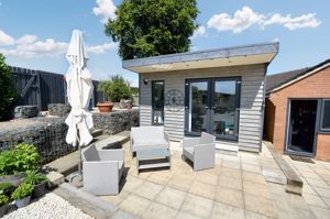 Side, patio and garden room- click for photo gallery